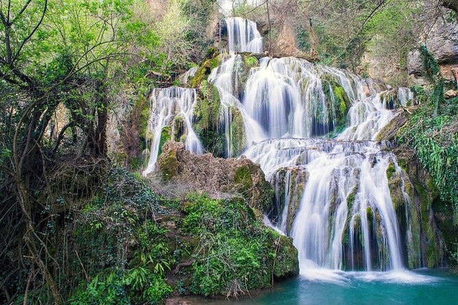 Private Day Trip to Krushuna Waterfalls and Devetashka Cave - Walking the travertine terraces at Krushuna